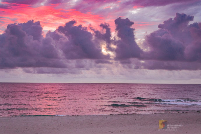 Pink and purple sunrise over the Atlantic Ocean at Pompano Beach, Florida