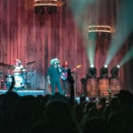 Justin Moore and his band performing live on stage at Toyota Arena in Ontario, California, during his Summer 2021 Tour.